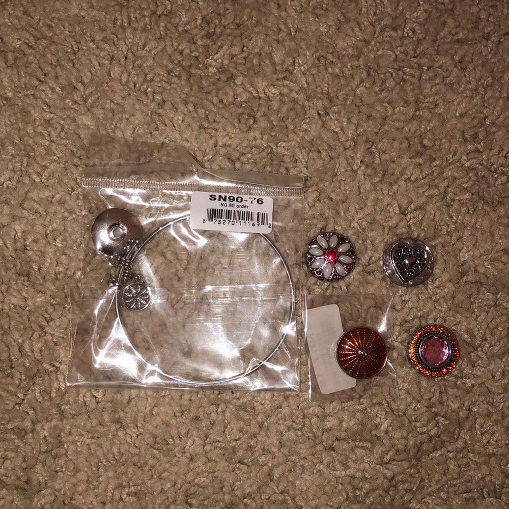 Metal bracelet with 4 charms